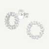 A pair of silver ear studs with cubic zirconia stones, designed with a circular openwork pattern.