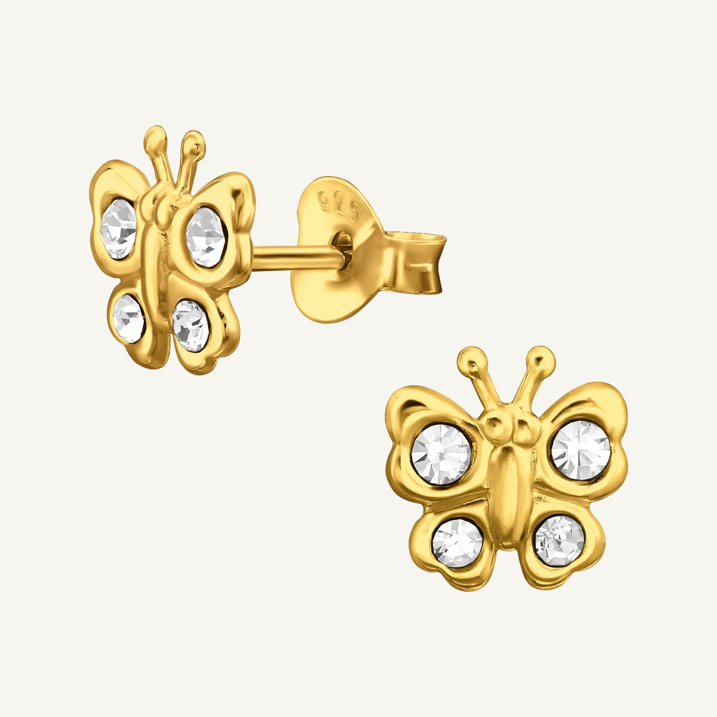 A pair of gold-plated sterling silver ear studs in the shape of butterflies, studded with crystals.